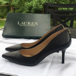 Black leather heels. Never worn.